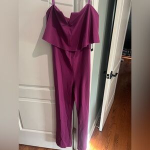 New with tags BeBe purple strapless jumpsuit romper pants Large